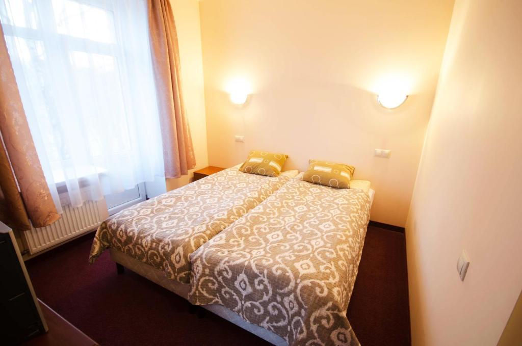 Apalenis Hotel Рига Стая снимка